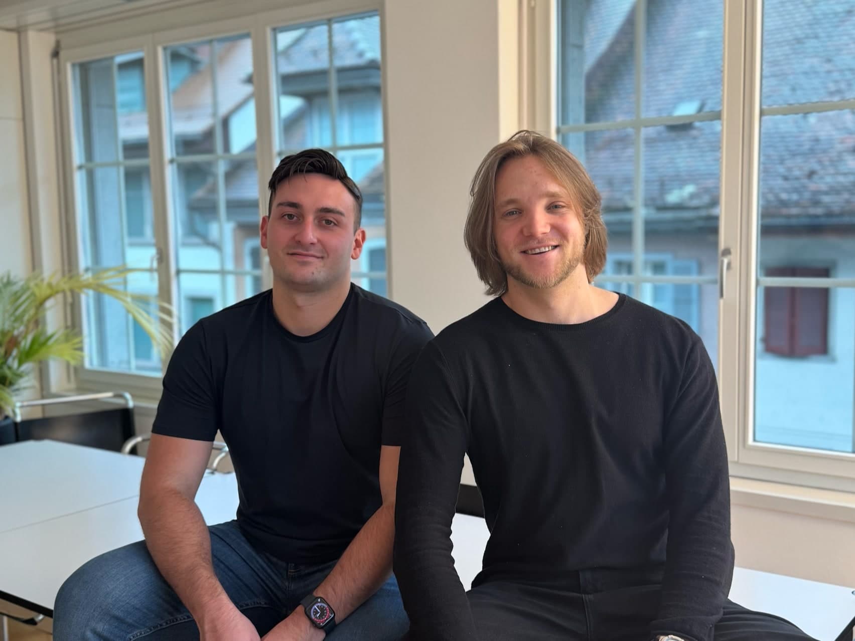 botts.ai cofounders Yves Zumbühl and Claudio Berardi in the Old Town of Zug